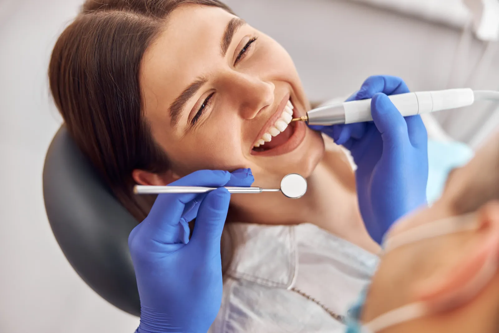 Smiling patient during a successful dental consult